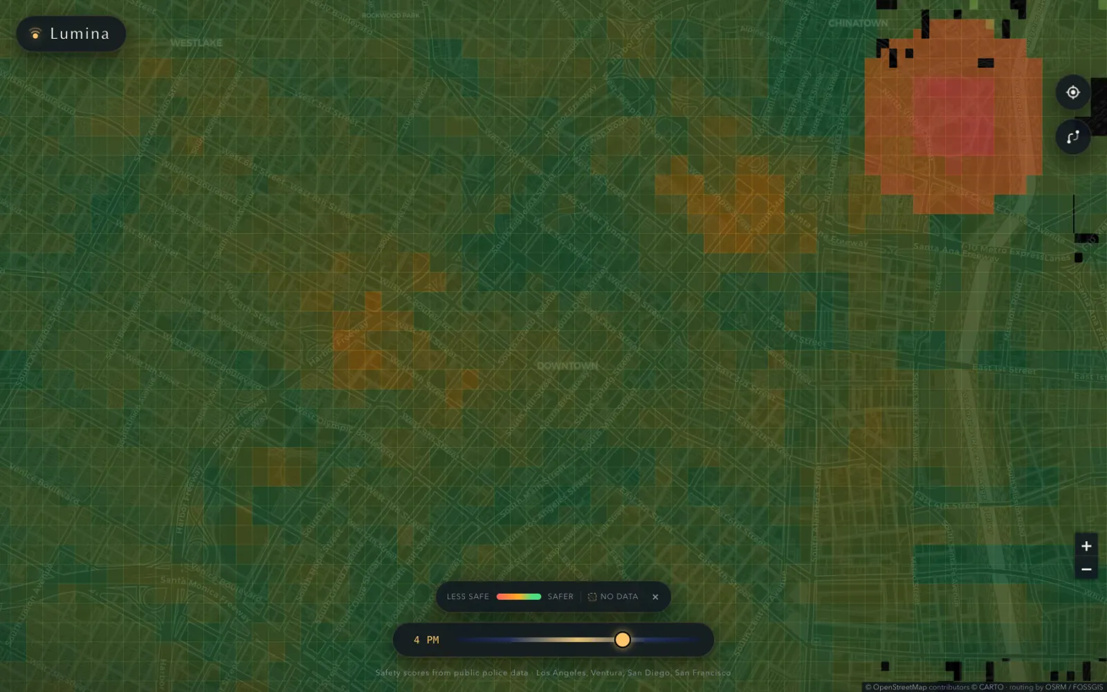 Dark map of downtown Los Angeles covered in a grid of colored squares, mostly green with orange and red patches, and an hour-of-day slider set to 4 PM